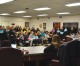 Teachers and staff fill school board meeting to demand salary increases