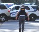 Armed suspect holds police officers at bay