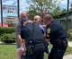 Cops caught in act rendering aid to elderly man